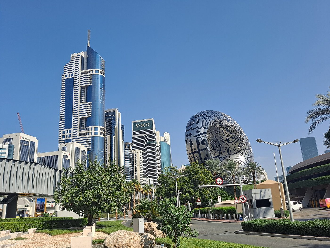 The Museum of the Future torus among the towers of Sheikh Zayed Road, daylight